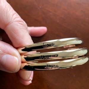 Set of 3 beautiful NWOT goldtone bangle bracelets.